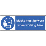 Masks must be worn when working here